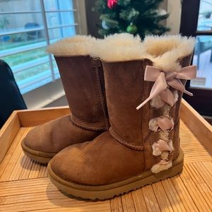 Little girl Ugg Boots with pink ribbon. VGUC size 13